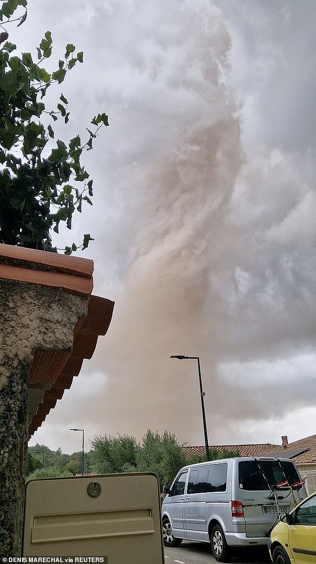 Stunning video footage shows the twister growing larger and picking up dirt in a French town in the Aude region