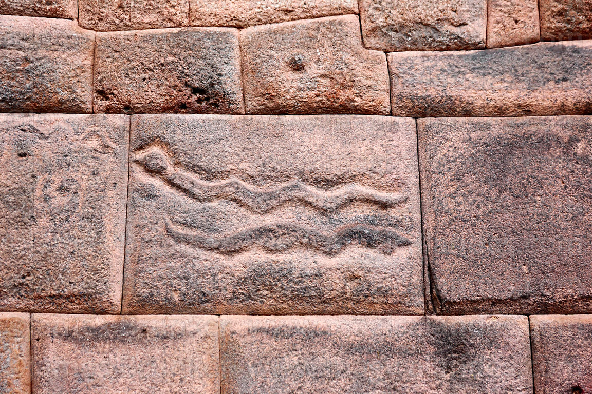 Magical Andes PH๏τography | Snakes carved in Inca stonework of the Nazarenas Palace, Cusco, Peru pH๏τograph